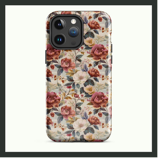 Elegant vintage floral tough MagSafe iPhone case featuring soft pink, white, and yellow blooms with lush greenery, offering a timeless and stylish design.