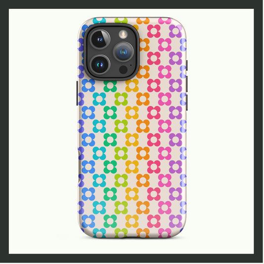 RAINBOW BLOOM Tough iPhone Case with dual-layer protection, featuring a vibrant rainbow floral design. Compatible with wireless charging.