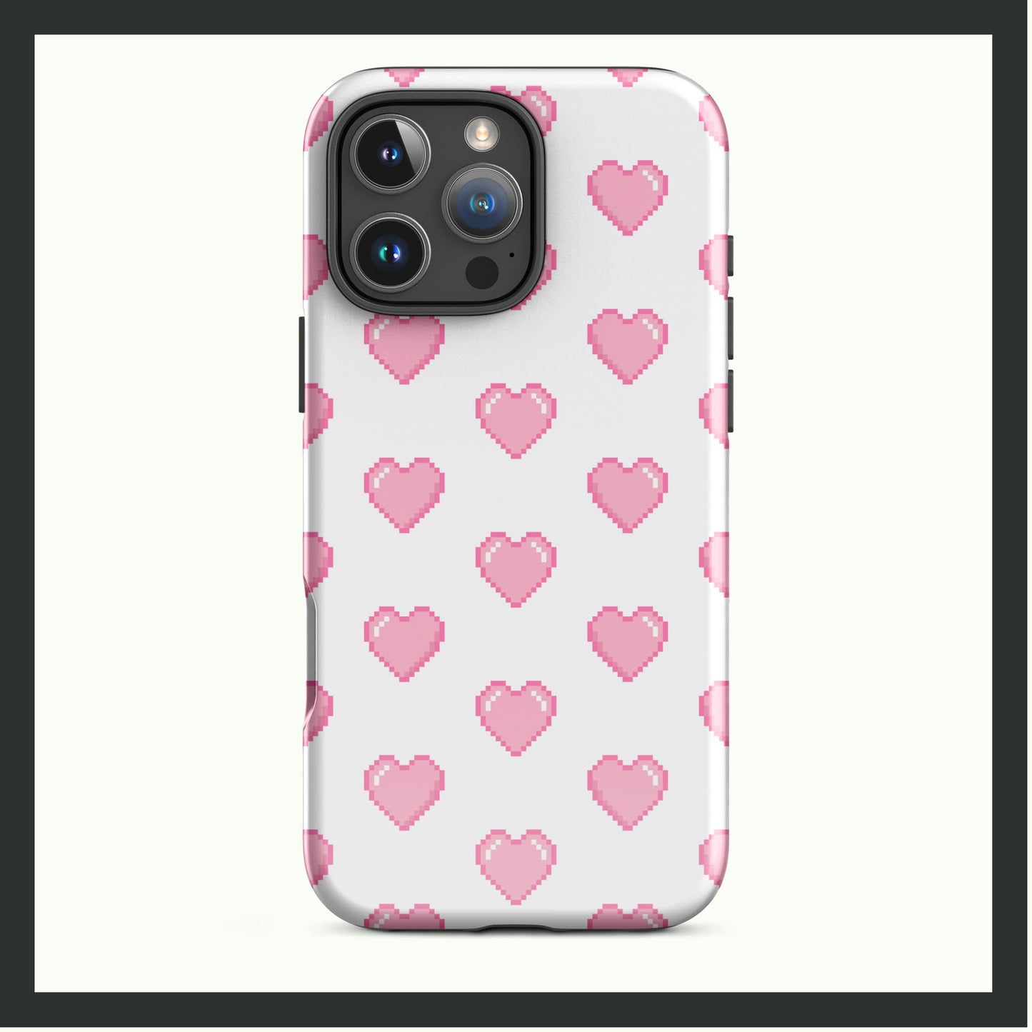 PIXEL HEARTBEAT Tough iPhone Case with pixel-style pink hearts on a white background, dual-layer protection, and wireless charging compatibility.